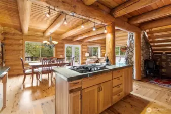 Large kitchen island with cooktop built in.