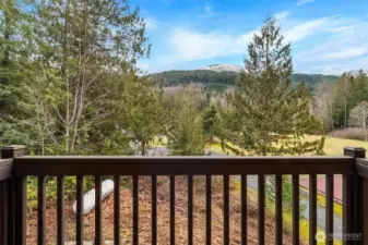 Mountain views from second floor loft living room balcony - plus views of clubhouse, pool, sport courts, and trails.
