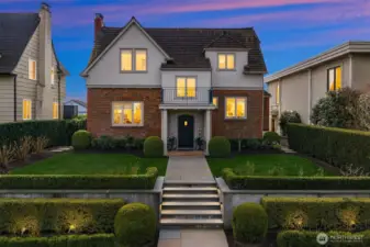 Outdoor lights set on sensors- notice the stair lights and the lights in the front garden.