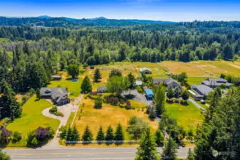 Aerial view that shows the front and back property.