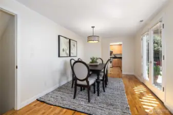 Dining area located between the kitchen and living area.