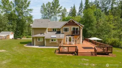 House, deck, chicken coop from yard