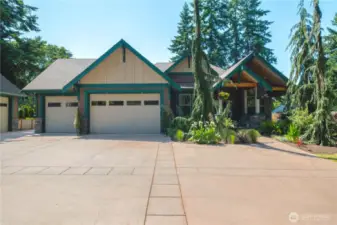 The 3 car attached garage has 9' tall doors.