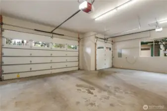 850sf attached 3 car wide garage.