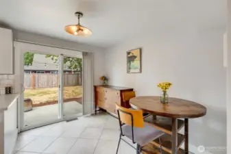 Eat in kitchen/dining open to back patio through large sliding glass door.