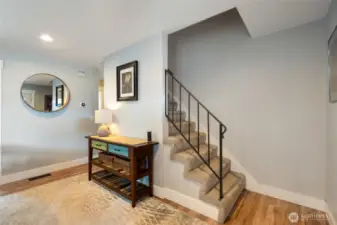 Entryway leading to staircase to upper level