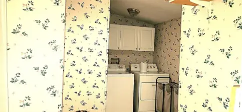 Utility room handly by kitchen