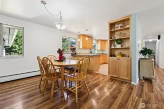 Dining room area flows easily into the kitchen and is open to the family room.