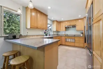 Kitchen with a breakfast bar.