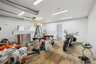 Detached garage/workshop with an art studio or office in the back. Cabinets can stay or go.
