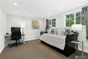 Versatile home layout includes this lower-level bedroom, perfect for a home office, exercise room, or guest space.