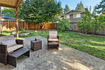 Enjoy sunny days in your garden paradise. Fruit trees along fence line include Cherry, Plum, Fig, and Asian Pear.
