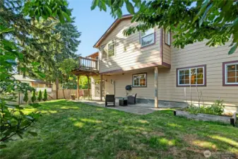Another view of spacious patio at back of home.