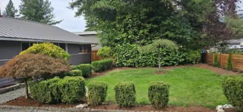 Lushly landscaped front yard