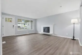 This quaint home has two separate living spaces each with their own wood burning fireplace!