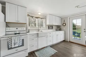 French door leads to back porch and large backyard