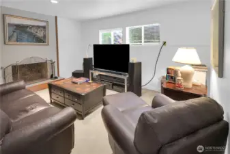 Lower level bedroom is spacious! Currently used as a media and game room with fireplace but it is a second suite! What will use this flexible floor plan for?