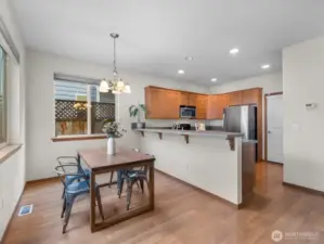 Dining nook adjacent to kitchen - perfect for entertaining