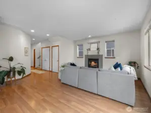 Experience effortless living in this bright expansive room, with its generous proportions and seamless flow into the rest of the home. This view if from the dining area towards the living area.