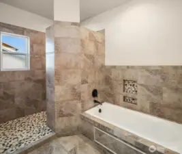 Light and bright primary en-suite bathroom