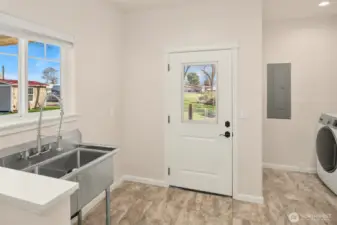 Main floor half bath laundry/mud room
