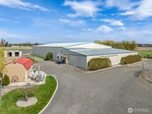 Indoor arena, 6 stall barn, living quarters, and more