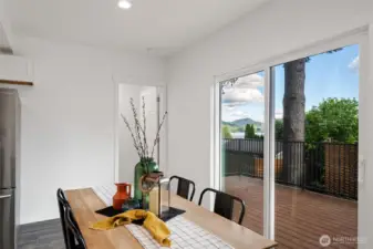 Looking from the dining room over the new Trex deck with Lake Samish beyond.