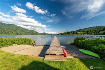 There is a nice sandy beach and a very long dock at the community beach.