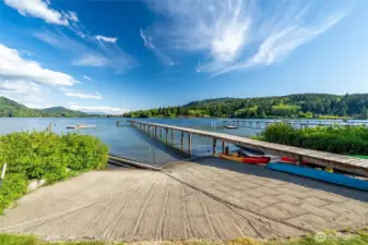 Another view of the well-maintained community beach with some of the residents kayaks and canoes.