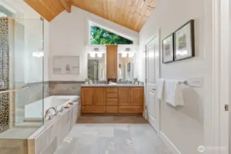 Welcome to your spa-inspired 5-Piece Primary Suite bathroom. Every detail has been thoughtfully considered—from the rich wood cabinetry and natural stone finishes. A true retreat designed to elevate your everyday.