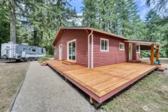 The big deck with covered entry. There is another great RV parking spot on the left.