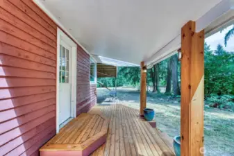 The big deck looking out the barn and chicken coop.