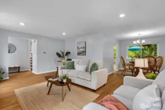 Tri-level design with kitchen, dining, and living on the main floor.