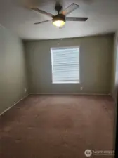 Primary bedroom with Ceiling Fan