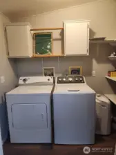 Washer and Dryer stay. Plenty of extra storage.
