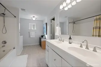 Spacious Primary Bathroom with dual sinks