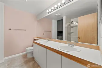 Primary ensuite has a nicely updated shower and linen closet~