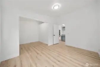 Bonus room showing huge room off of it.