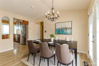 Dining Area off the living room and kitchen. French doors to the back patio.