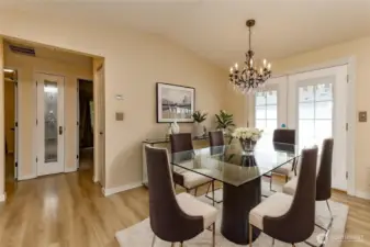Dining Area off the living room and kitchen. French doors to the back patio.