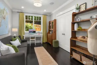 This is the bedroom on the main floor. It's currently set up as an office.