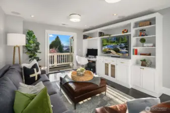 One of the 4 bedrooms upstairs, currently set up as a bonus room/office