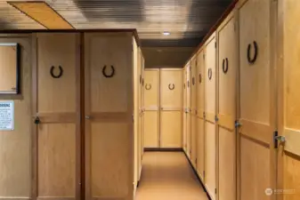 31 custom made hard maple upright lockers.  29 of the lockers are equipped with bridle and saddle racks.