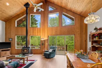 Large windows overlooking the river and yard!