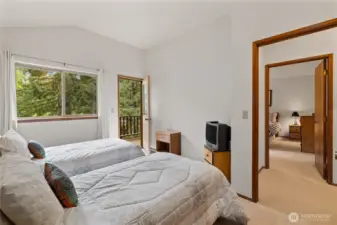 Upstairs bedroom with balcony
