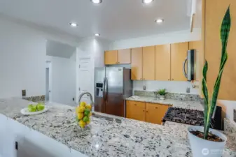 Eat-at kitchen bar can easily fit 5 barstools!