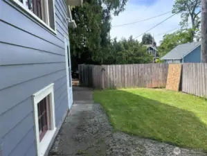 Around towards the back side of the home!
