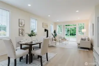 Enjoy the seamless flow of this open-concept layout, where the dining area and living room connect to the kitchen with ease. A bright and welcoming space that balances everyday comfort with effortless style.