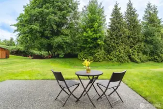 Step outside to a tranquil patio that invites you to relax, unwind, and enjoy the soothing sounds of the nearby creek. A perfect spot for morning coffee or evening conversations.