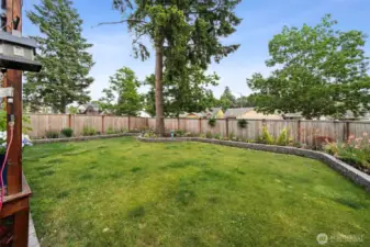Fully fenced Backyard with beautiful Landscaping